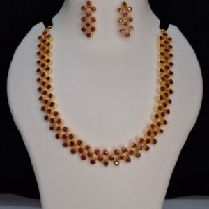 Gold plated necklace with red stones